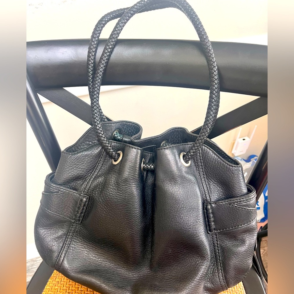 Black leather Cole Haan purse.